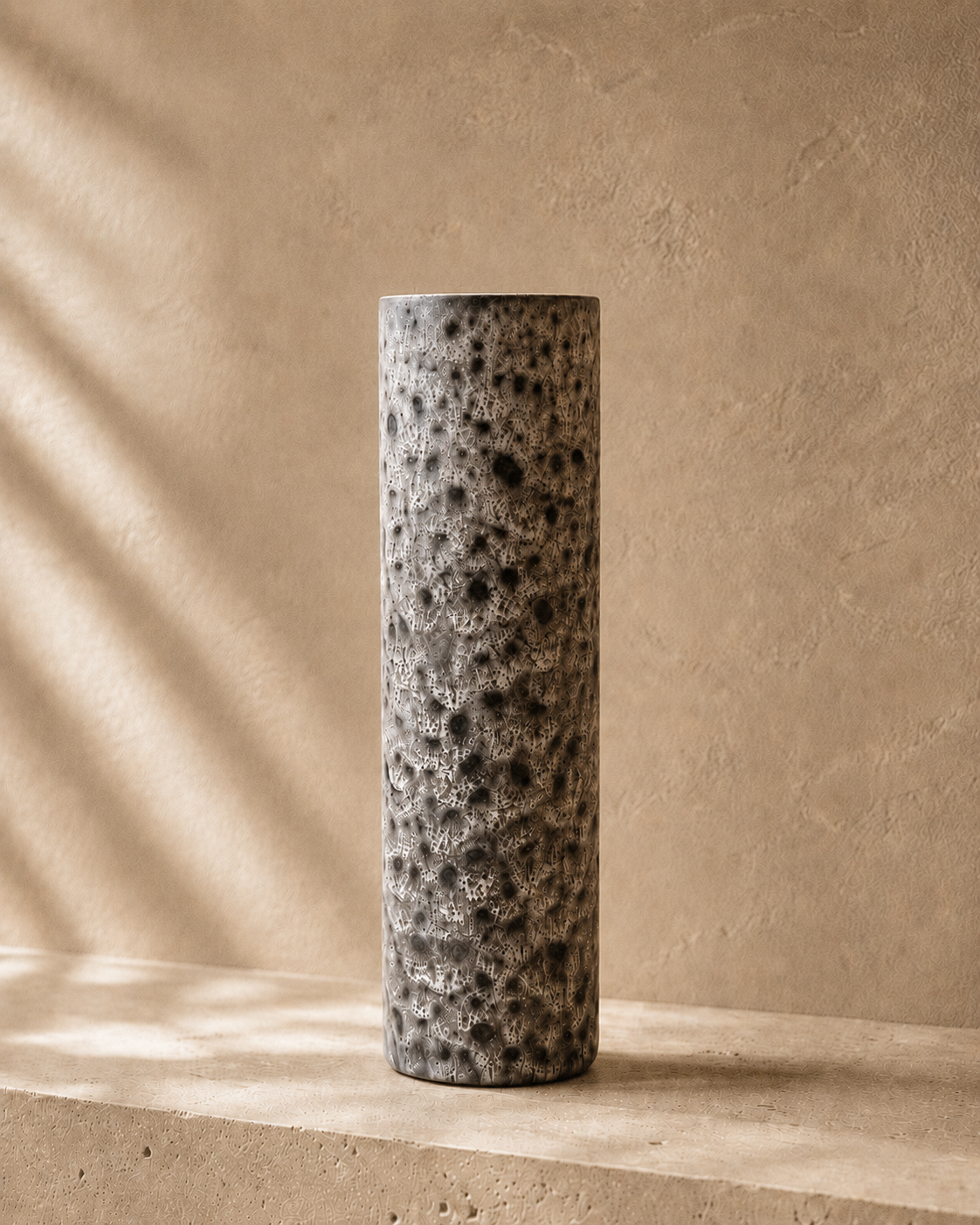 Volcanic Speckle Column Vase product image on a warm stone surface